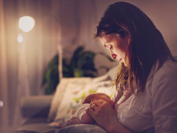 Mom breastfeeding baby Mom breastfeeding baby