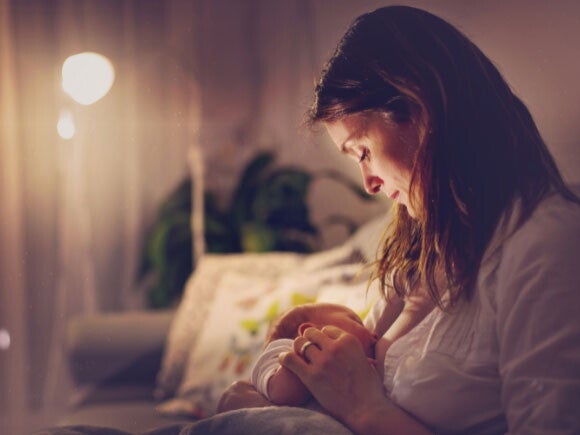 Mom breastfeeding baby