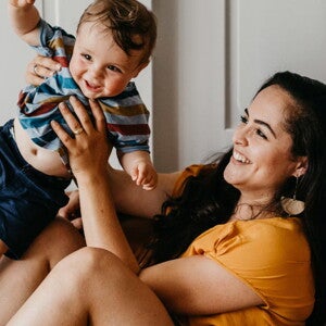 Parents playing with their baby boy