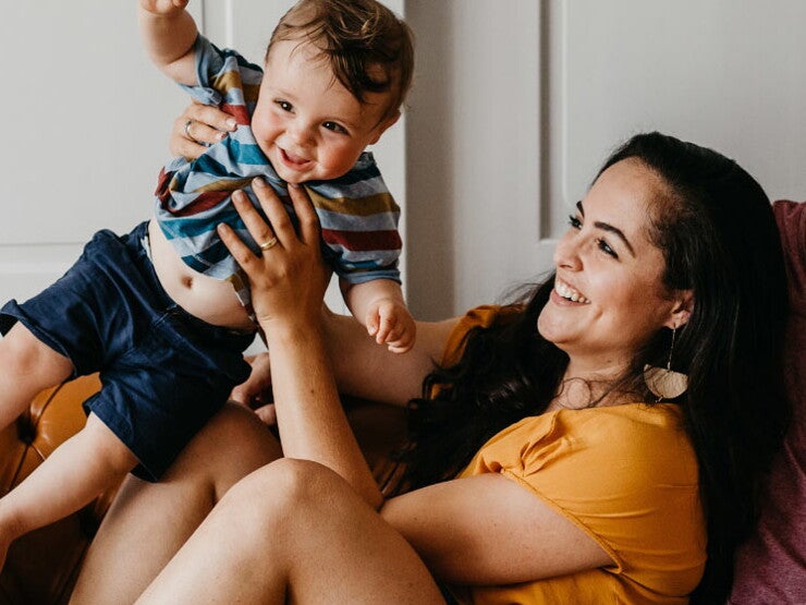 Parents playing with their baby boy